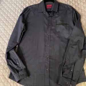 Men’s dark blue long sleeve gabardine shirt w front pocket, back yolk. Slimline